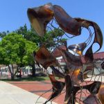 Sculpture, monument dedication commemorates dark chapter in Atchison