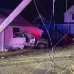 One injured after vehicle hits house